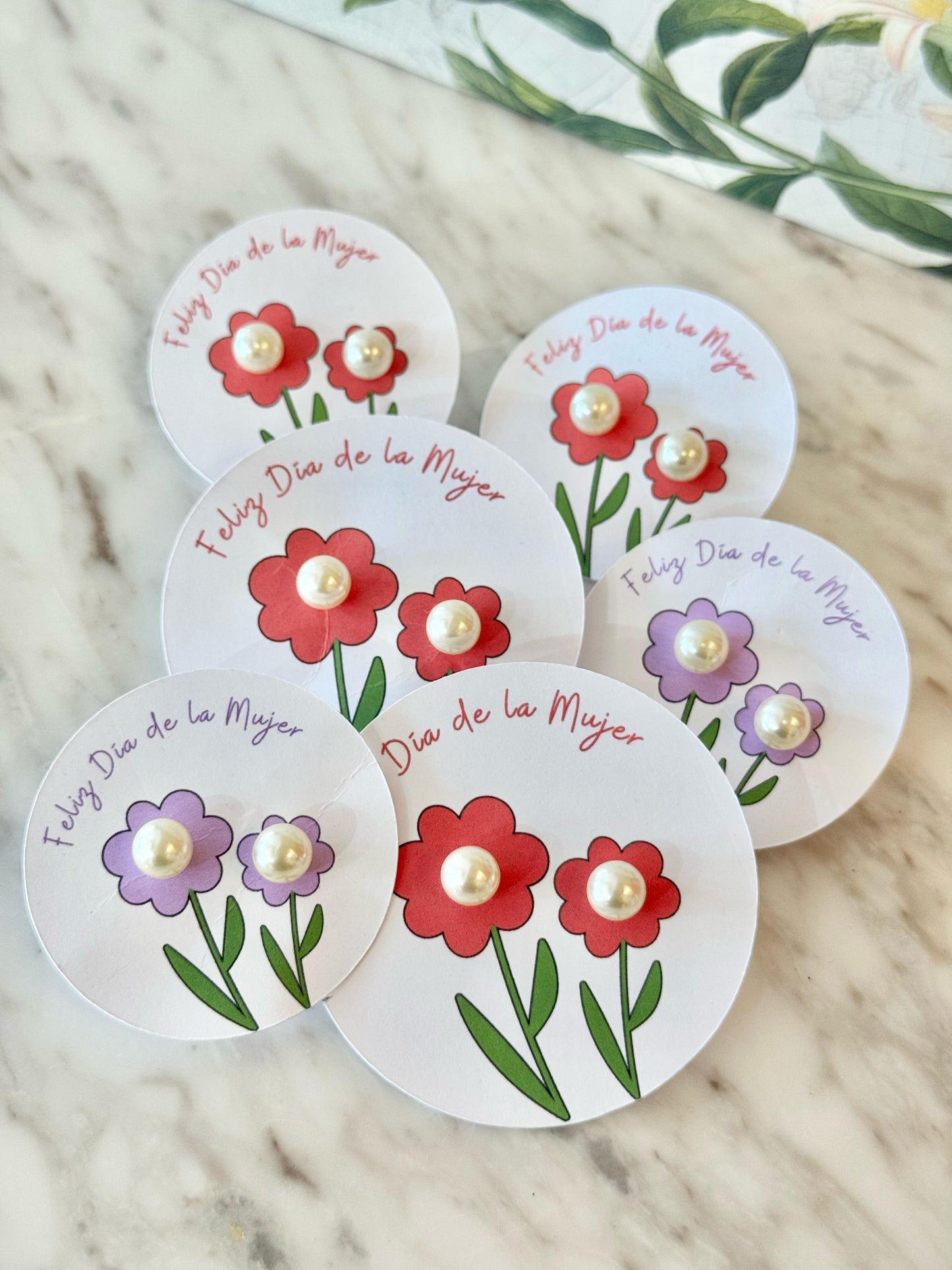 Aretes perlas con tag