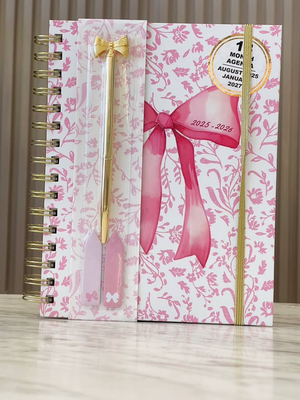 Agenda con lapicero